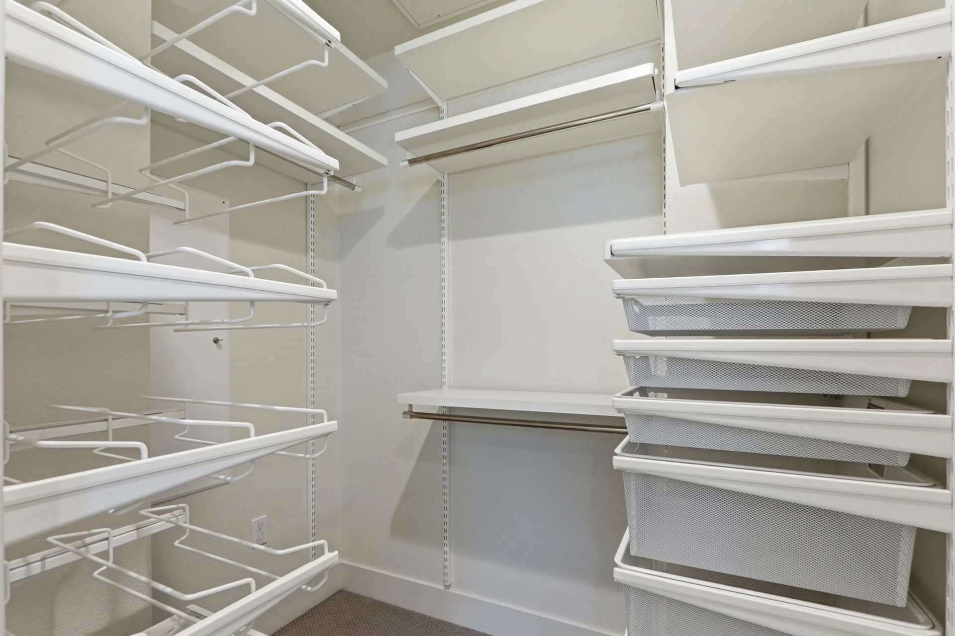 Walk-in closet with full shelving systems